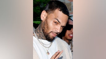 Chris Brown held in CUSTODY - Fox News