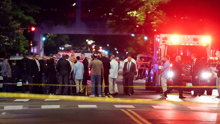 Group of people gathered near ambulance - Fox News