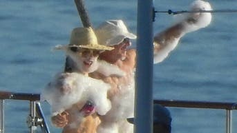 Jeff Bezos, Lauren Sánchez spotted in intimate embrace during foam party aboard yacht - Fox News