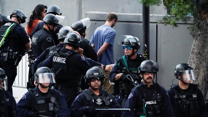 Guy in blue shirt detained - Fox News