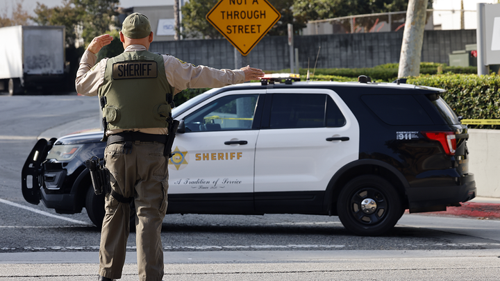 Officer directing traffic - Fox News