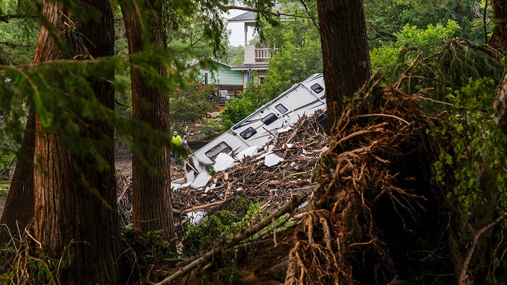 Tipped over RV in trees - Fox News