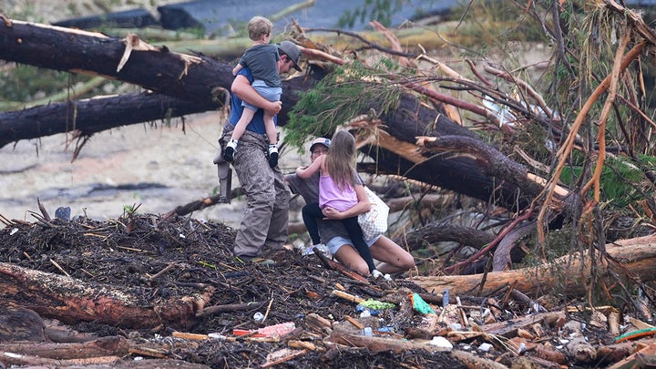 people carrying kids - Fox News