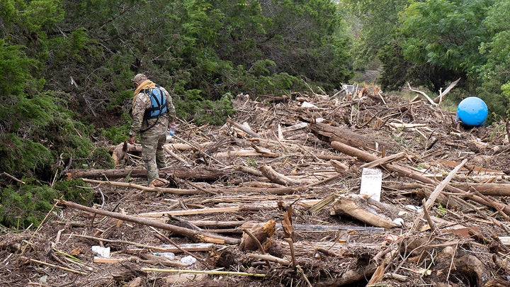 Man surrounded by sticks - Fox News