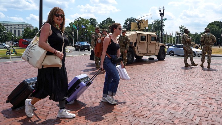 women with suitcases - Fox News