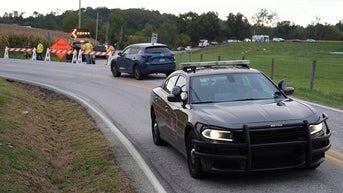 police car, road closed sign - Fox News