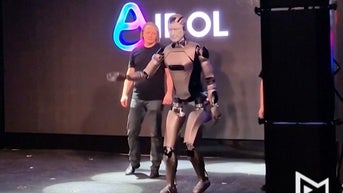 Robot falls and flails onstage during grand debut in Russia - Fox News