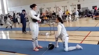 Woman who knelt to protest trans fencer reveals conditions of return to sport - Fox News