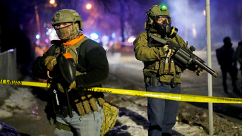 2 officers standing by caution tape - Fox News