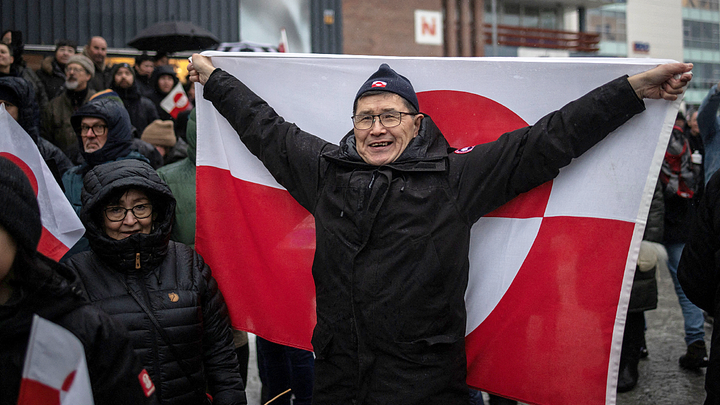 Man holding red and white flag - Fox News