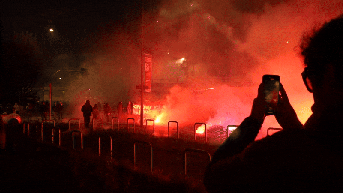 Fireworks fly as hooded protesters clash with police after Olympics open - Fox News