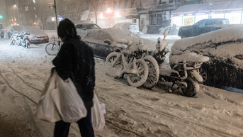 snow piled on bikes, cars - Fox News