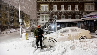Car covered in snow - Fox News