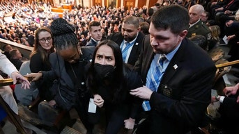 'Squad' member says guest faces criminal charge for standing during State of the Union - Fox News