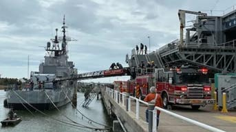 30 people saved after walkway between pier, WWII destroyer collapses into water - Fox News