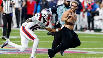 NFL rookie springs into action as spectator runs onto field during Super Bowl - Fox News