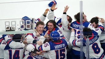 celebrating against glass - Fox News