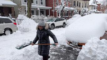 Woman shoveling snow - Fox News