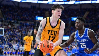 Saint Louis player shoves VCU guard as bench-clearing brawl erupts - Fox News
