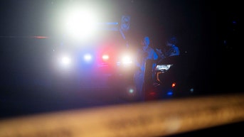 caution tape over police car - Fox News