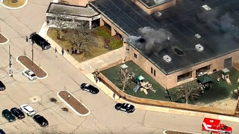 Shooting suspect rammed car into building, exited with rifle and opened fire, source says - Fox News