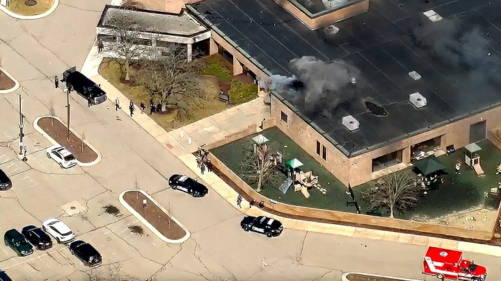 Shooting suspect rammed car into building, exited with rifle and opened fire, source says - Fox News