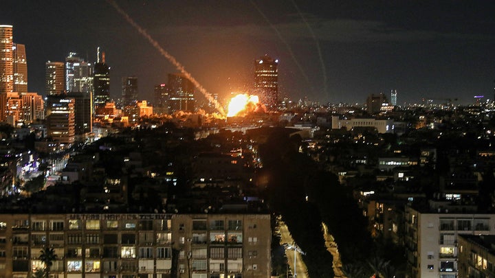 Rockets seen flying over Tel Aviv, as Israelis take to bomb shelters amid Iran retaliation - Fox News