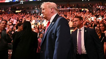 Roaring fans welcome Trump cageside as commander in chief hits UFC 327 - Fox News