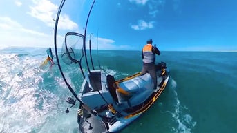 Pro surfer keeps his cool after being caught in a shark feeding frenzy - Fox News