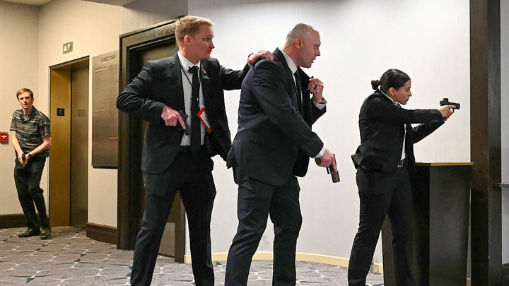 secret service officers in a hallway - Fox News