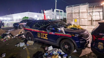 LITTERED COP CAR - Fox News