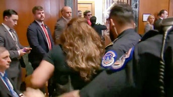 Woman escorted out of Senate hearing after interrupting War Secretary Hegseth - Fox News