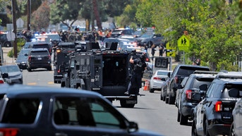 officer on police armored vehicle - Fox News