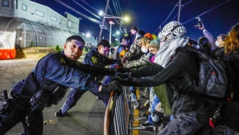 OFFICER CLASHING WITH AGITATORS - Fox News