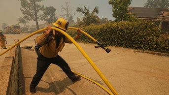 firefighter with hose - Fox News