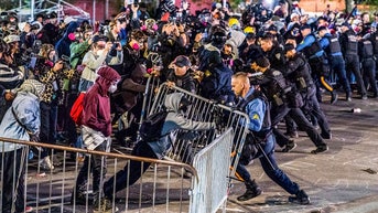 POLICE HOLDING BARRICADE - Fox News