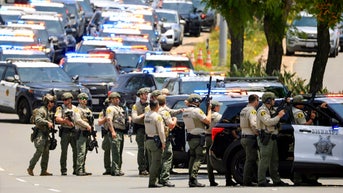 lots of officers and cruisers - Fox News