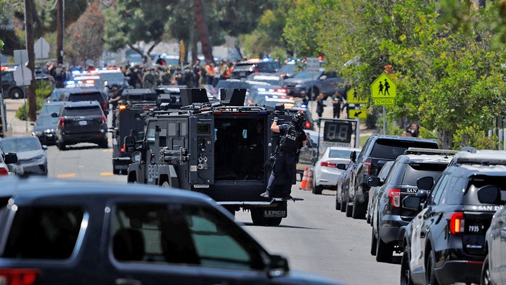 officer on police armored vehicle - Fox News