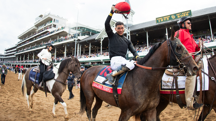 Jockey raising helmet - Fox News