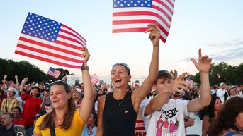 CROWD HOLDING FLAGS - Fox News