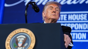 Looks over podium - Fox News