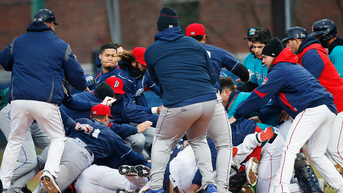 Runner sucker punches third baseman in the face during routine rundown, sparking brawl - Fox News