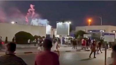 Flames burn as migrants breach Spain border - Fox News