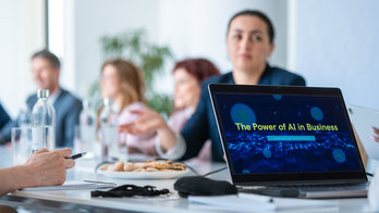 Experts warn AI disruption is hitting the office, but predict a massive ‘productivity boom’ for US workers