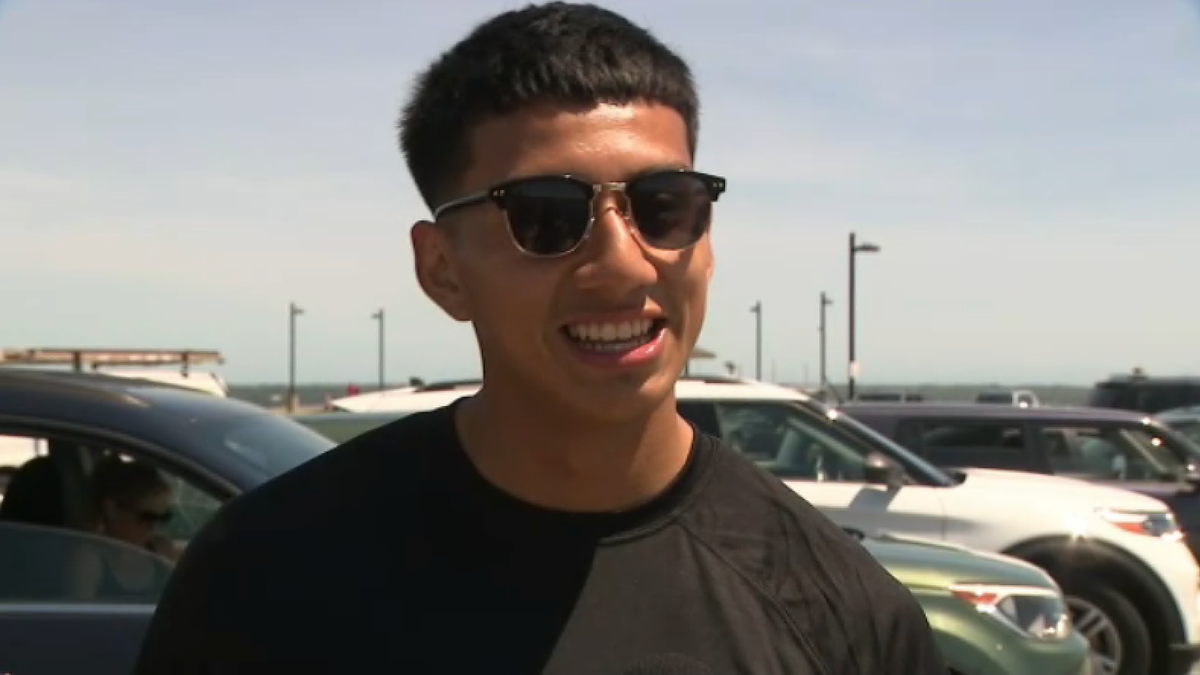 Anthony Zhongor wearing sunglasses and a t-shirt