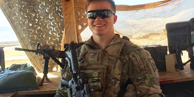 Ryan smiles for a photo during his first deployment to Afghanistan as a gunner in the 82nd Airborne Division in 2016.