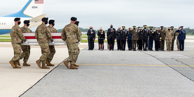 A U.S. Army carry team transfers Ryan's remains Aug. 29, 2021, at Dover Air Force Base, Delaware. 
