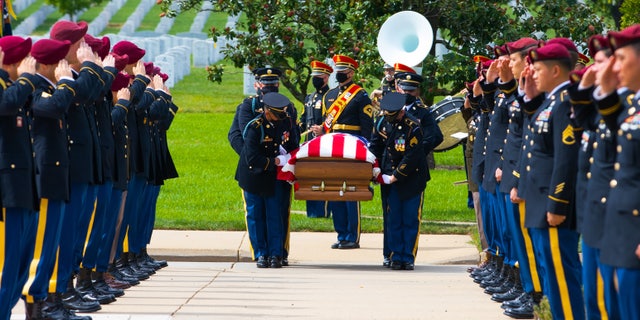 Members of the 3rd Infantry Regiment (The Old Guard) perform Honor Guard duties during Ryan's funeral on Sept. 21, 2021, at Arlington National Cemetery.