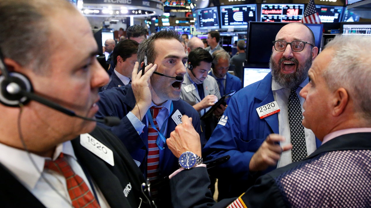 S&P captures record, Dow jumps 279 points