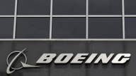 Boeing's 1Q Profit Hit by Tanker Charge
